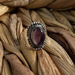 Amethyst and silver Bohemian women’s ring size 6 
Gorgeous little ring!